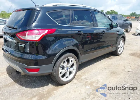 2016 Ford Escape Titanium z USA, uszkodzony, nr VIN 1FMCU0JX8GUB03579